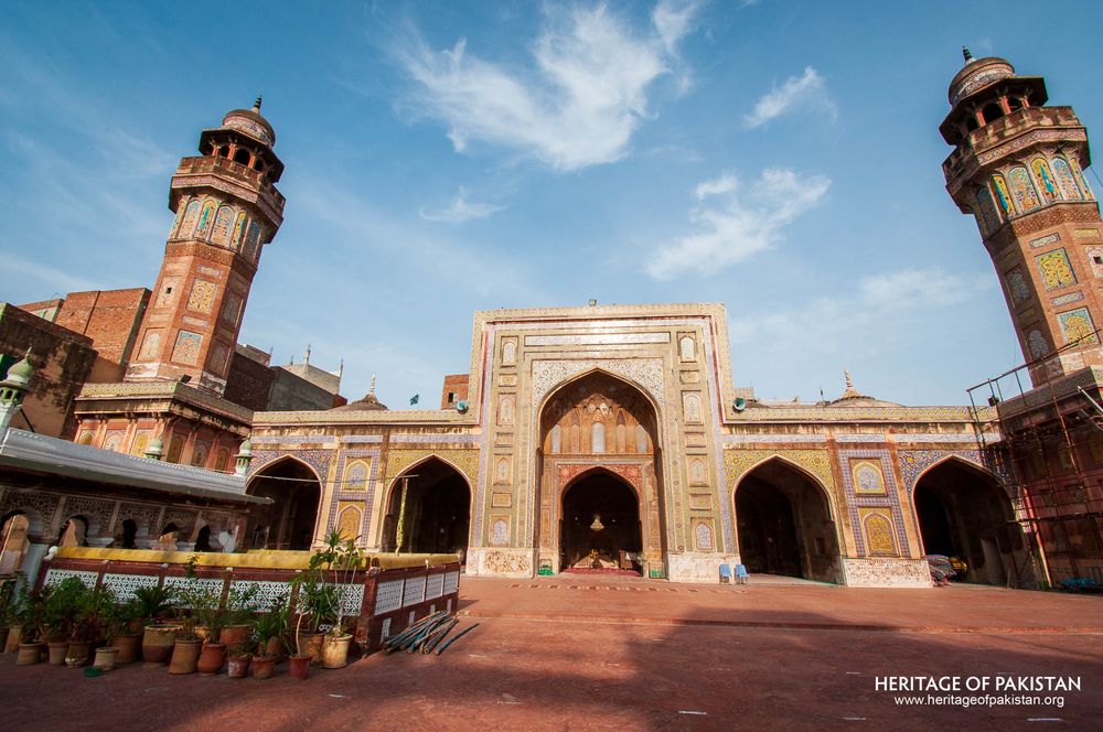 The Wazir Khan Mosque's courtyard opens toward its grand central gateway.